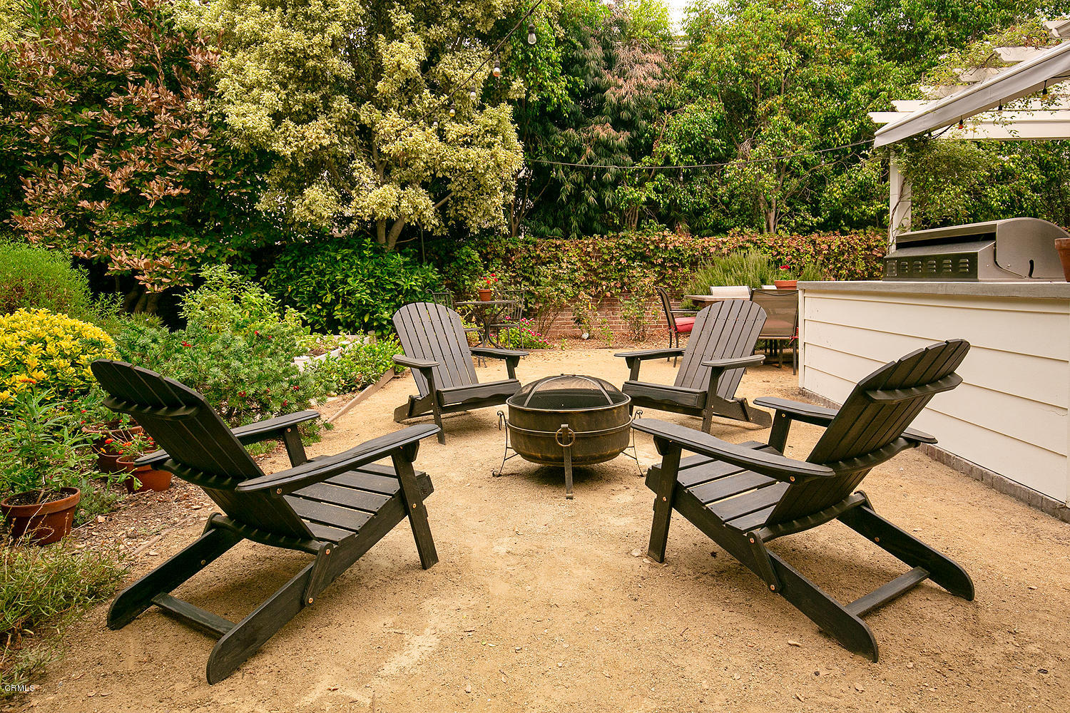 1041 Prospect Boulevard Pasadena, CA 91103 - Photo 39 of 47 a view of a backyard with sitting area