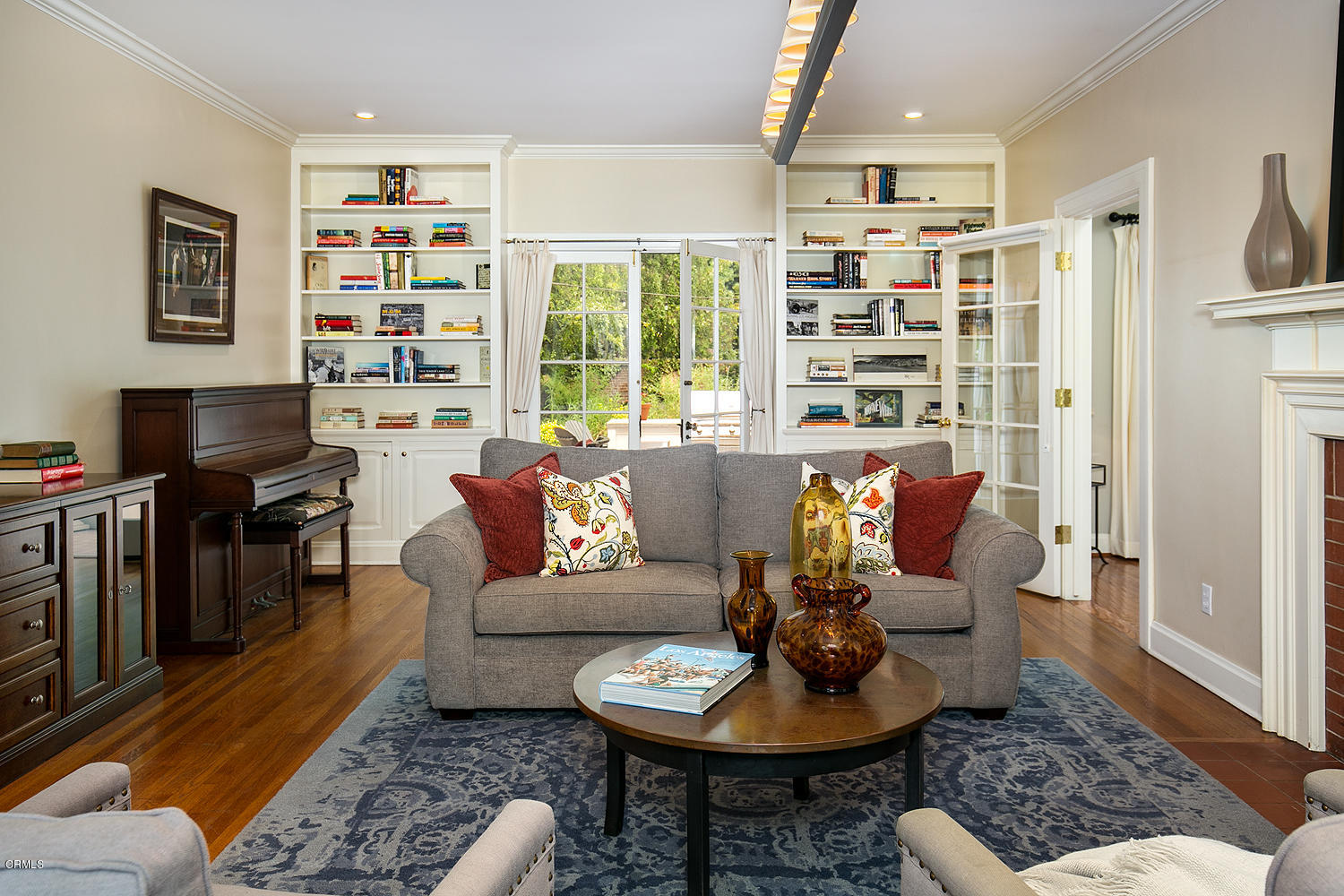 1041 Prospect Boulevard Pasadena, CA 91103 - Photo 7 of 47 a living room with furniture and a book shelf