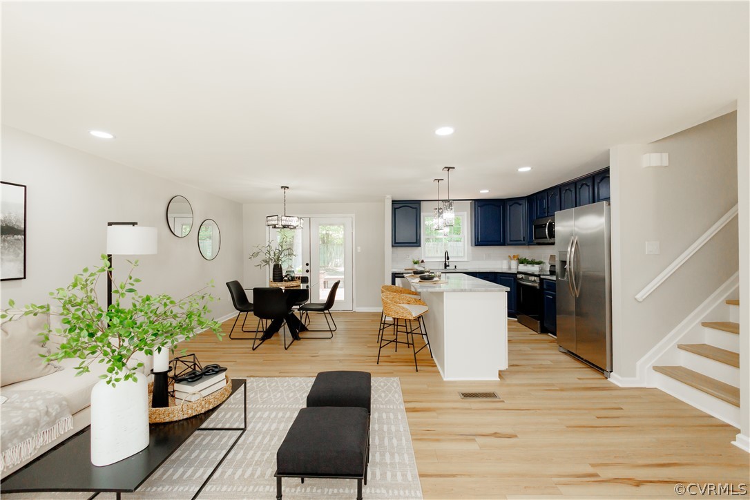 4719 Mill Park Circle Glen Allen, VA 23060 - Photo 11 of 49 a living room with couches kitchen view and kitchen view