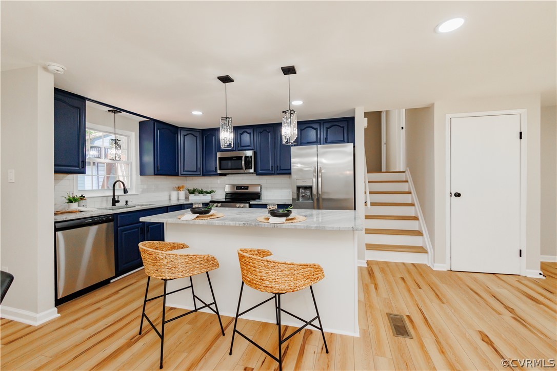 4719 Mill Park Circle Glen Allen, VA 23060 - Photo 16 of 49 a kitchen with refrigerator and cabinets