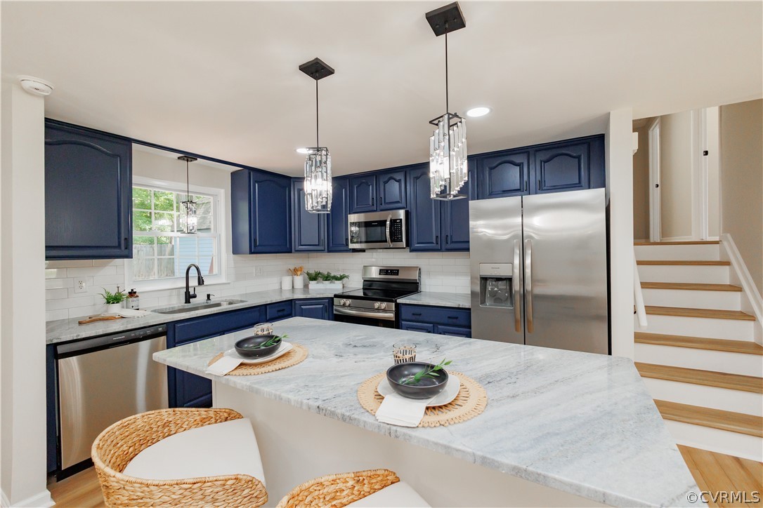 4719 Mill Park Circle Glen Allen, VA 23060 - Photo 17 of 49 a kitchen with stainless steel appliances granite countertop a sink refrigerator stove microwave and cabinets
