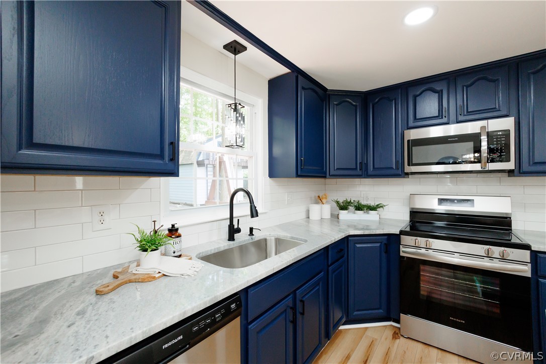 4719 Mill Park Circle Glen Allen, VA 23060 - Photo 22 of 49 a kitchen with a sink stove and microwave