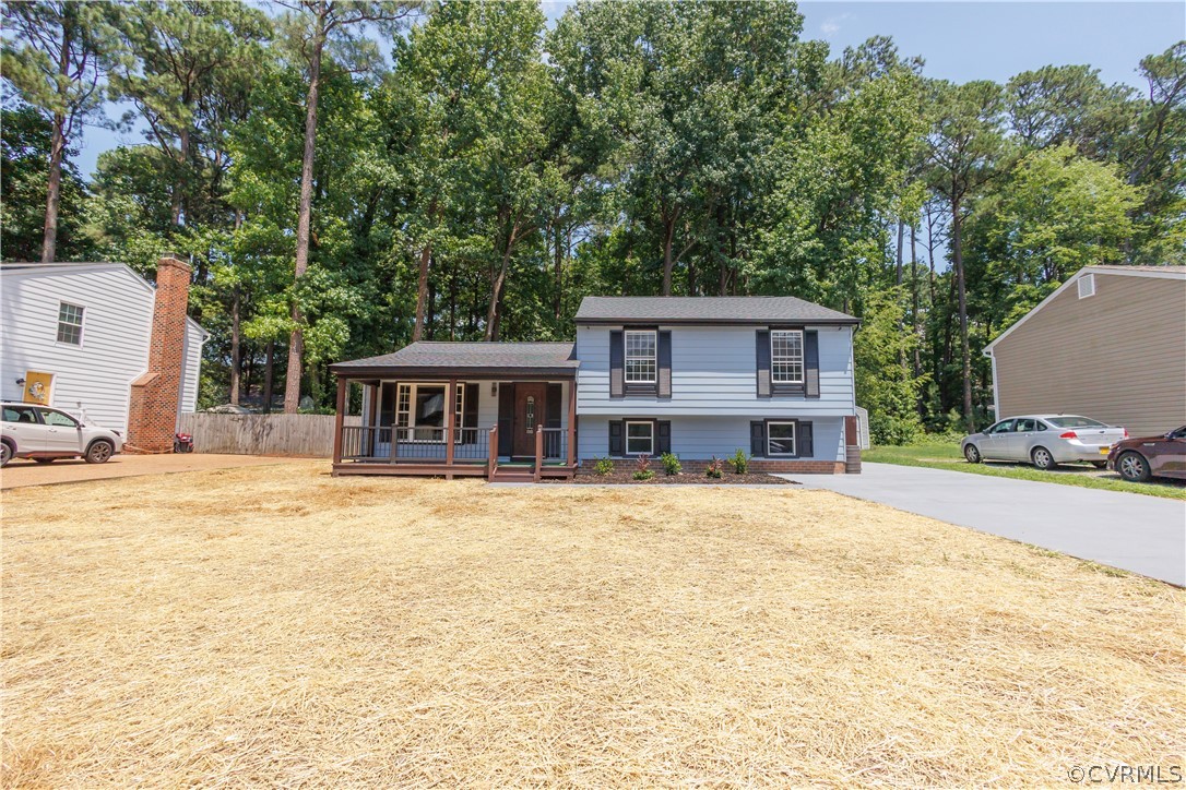 4719 Mill Park Circle Glen Allen, VA 23060 - Photo 3 of 49 a front view of a house with a yard