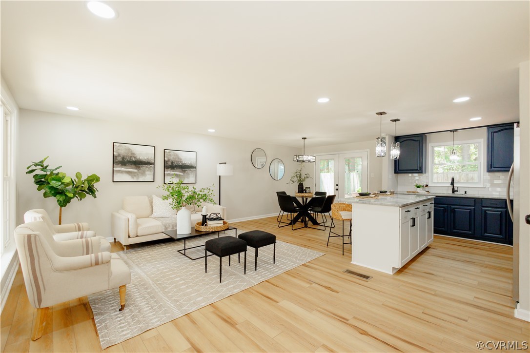 4719 Mill Park Circle Glen Allen, VA 23060 - Photo 10 of 49 a living room with furniture kitchen view and a wooden floor