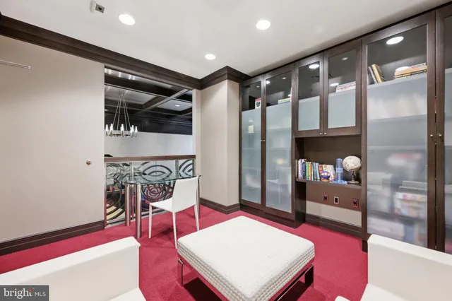 a view of a building with potted plants