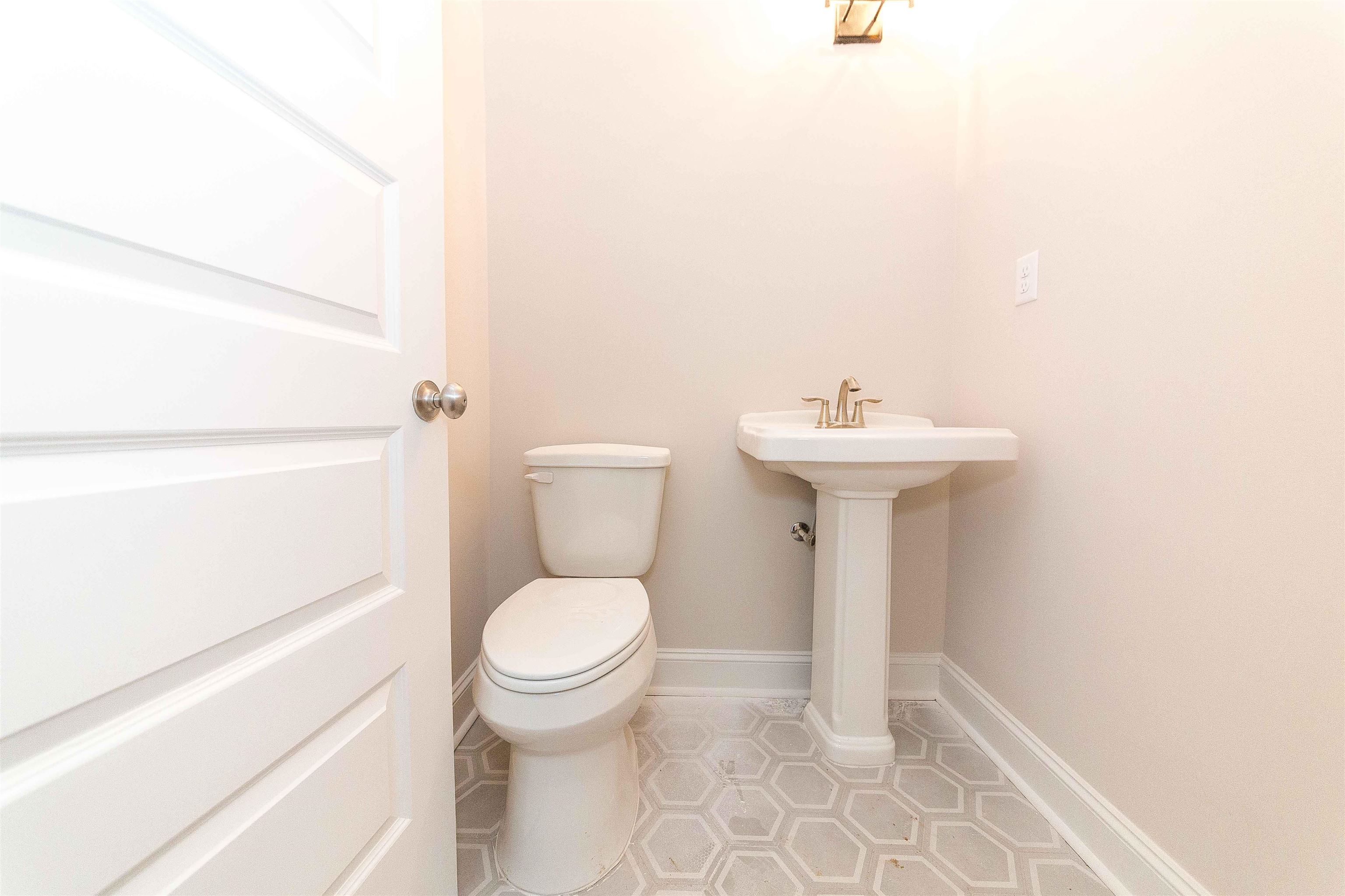 6441 Mccord Loop Arlington, TN 38002 - Photo 8 of 23 a bathroom with a sink toilet and a mirror