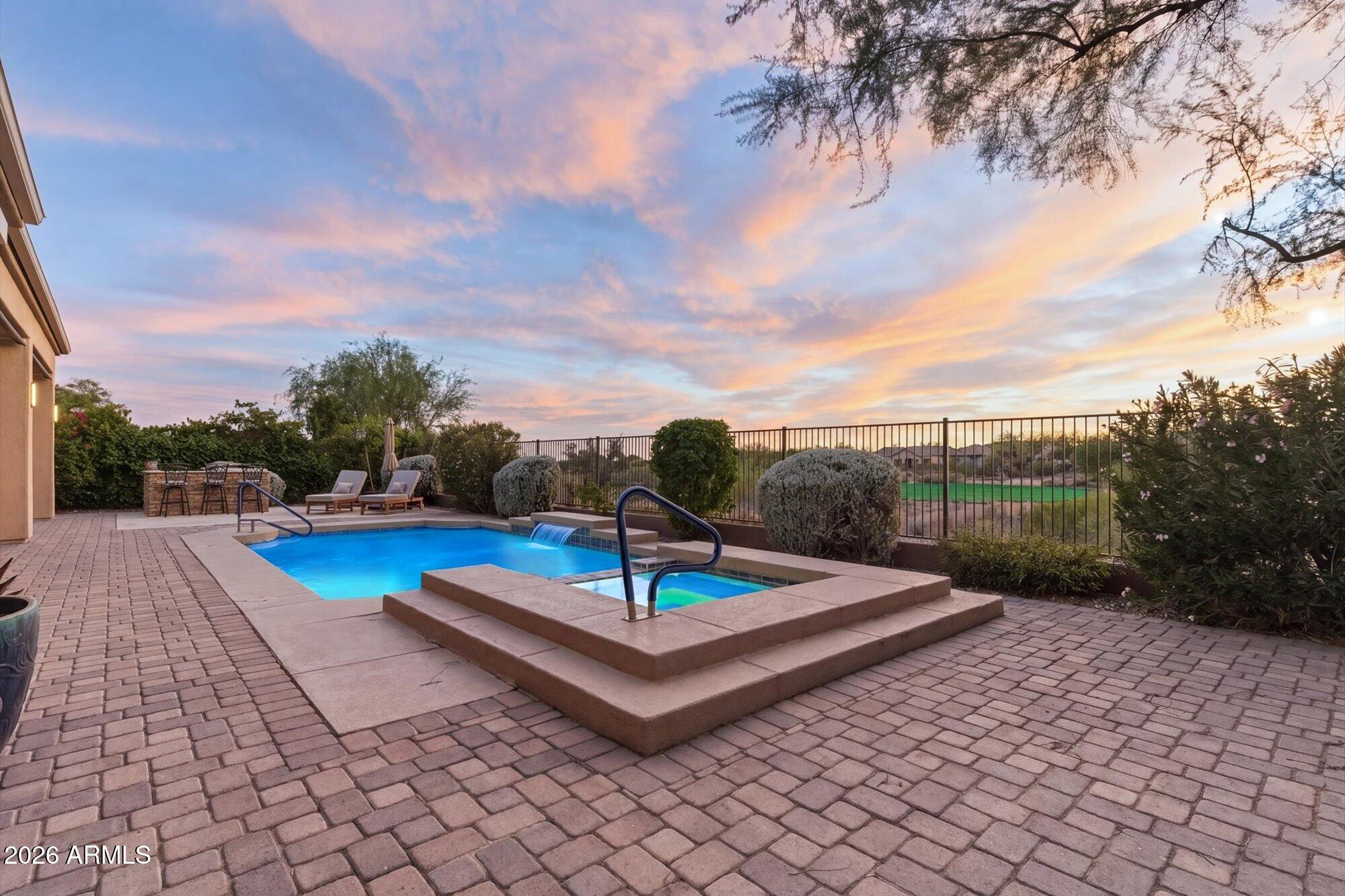 40322 North Hawk Ridge Trail Anthem, AZ 85086 - Photo 46 of 63 a view of a patio with a table
