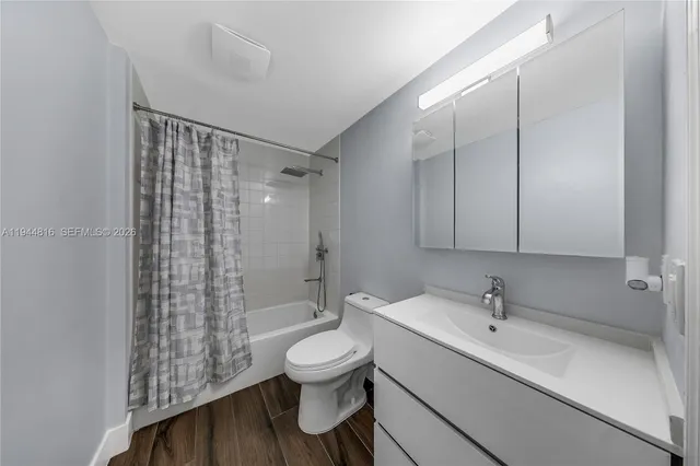 a view of a lake with couches chairs