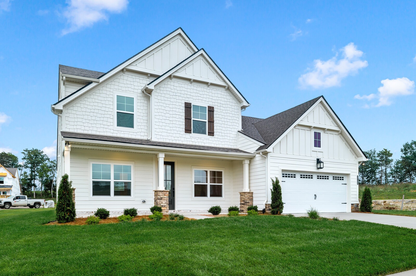 1733 Merkel Road Columbia, TN 38401 - Photo 4 of 53 a front view of a house with a garden and plants