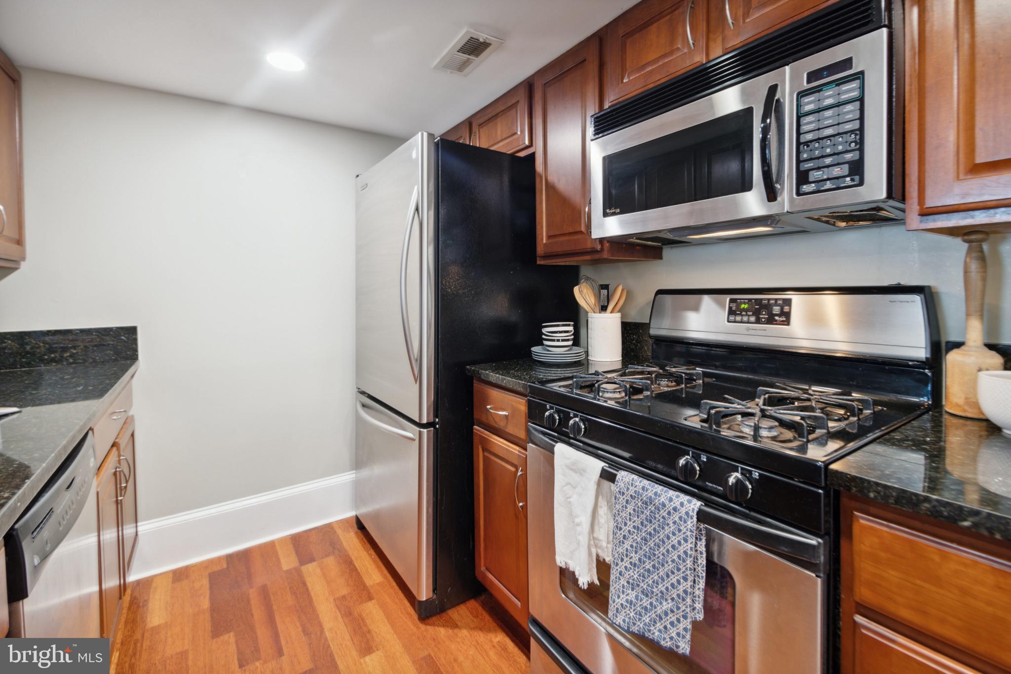 1324 Euclid Street Northwest, Unit 5 Washington, DC 20009 - Photo 19 of 28 Kitchen With Stainless Steel Appliances