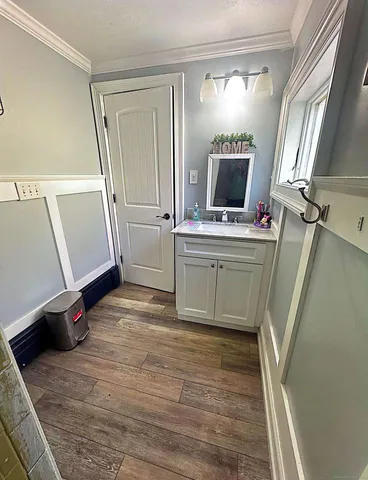 a room with mirror and a window