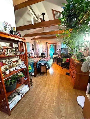 a view of a porch with furniture