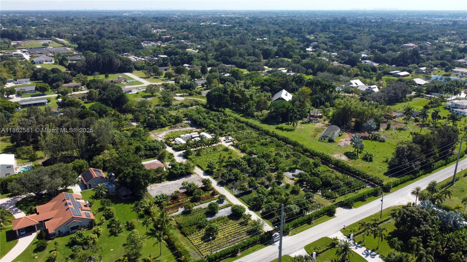 5960 Southwest 190th Avenue Southwest Ranches, FL 33332 - Photo 22 of 32 an aerial view of residential houses with outdoor space and trees