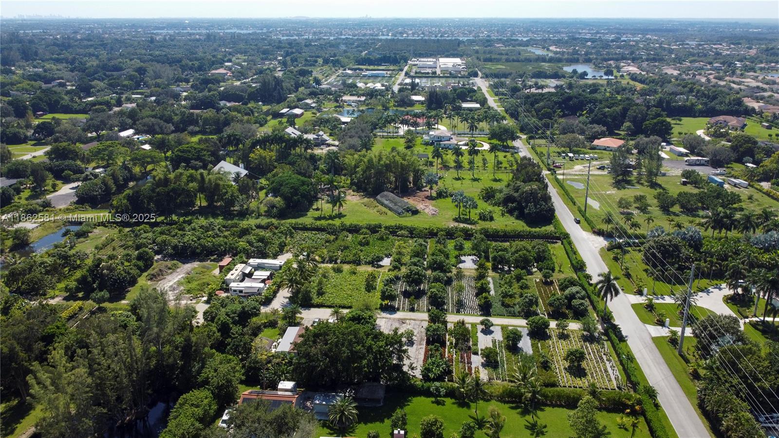5960 Southwest 190th Avenue Southwest Ranches, FL 33332 - Photo 23 of 32 an aerial view of residential houses with outdoor space and trees