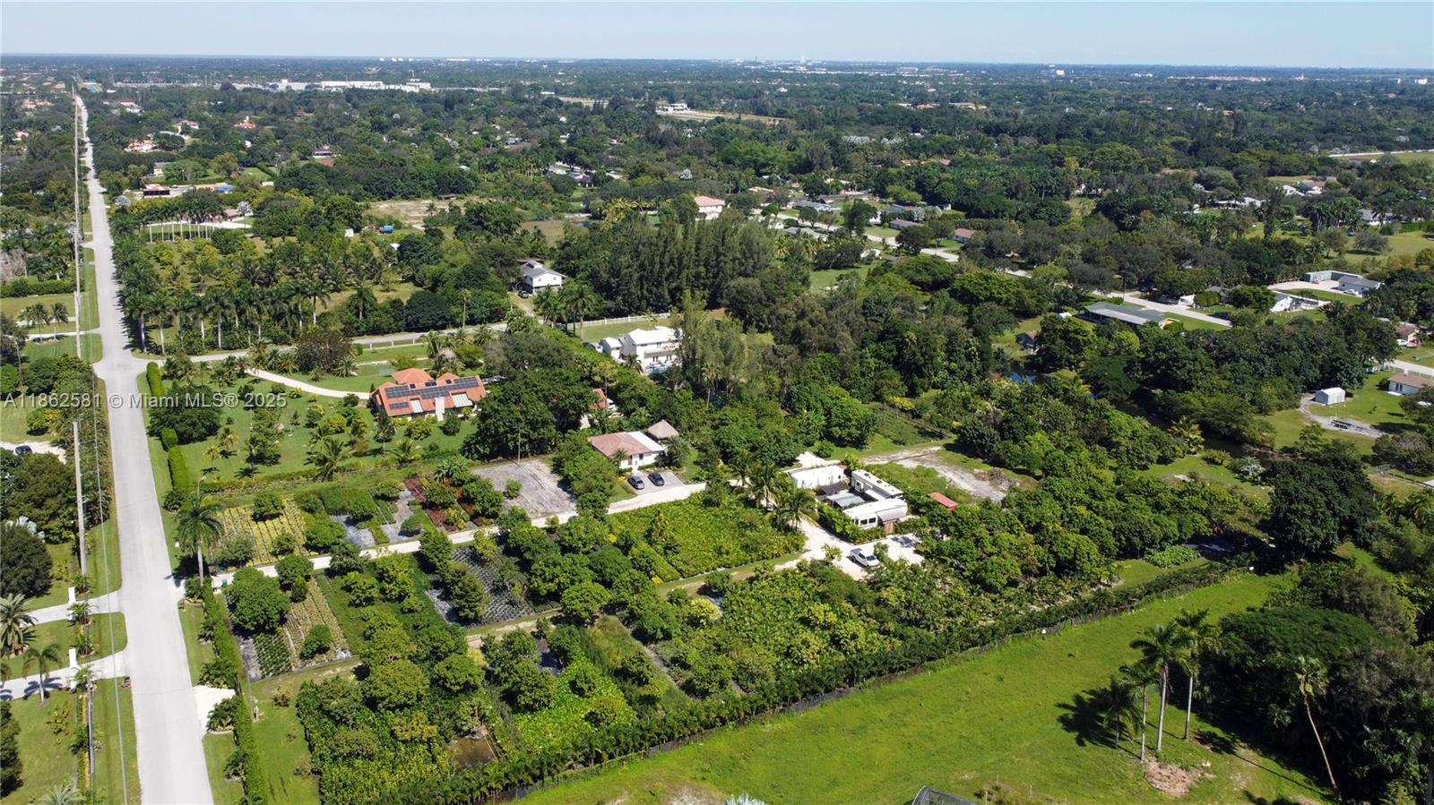 5960 Southwest 190th Avenue Southwest Ranches, FL 33332 - Photo 26 of 32 an aerial view of residential houses with outdoor space and trees