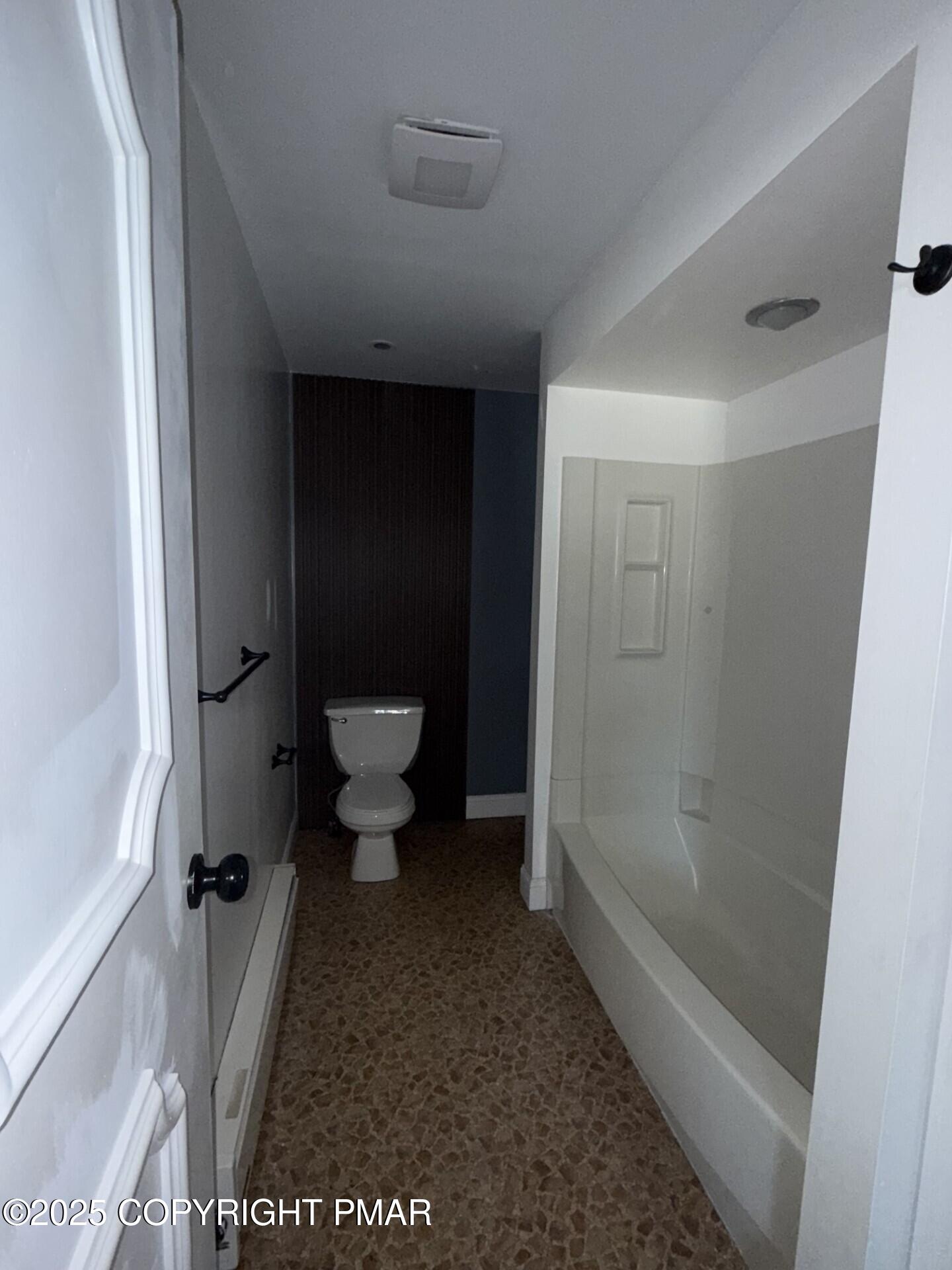 132 East Main Street, Unit 1C Girardville, PA 17935 - Photo 12 of 13 a bathroom with a toilet and a shower