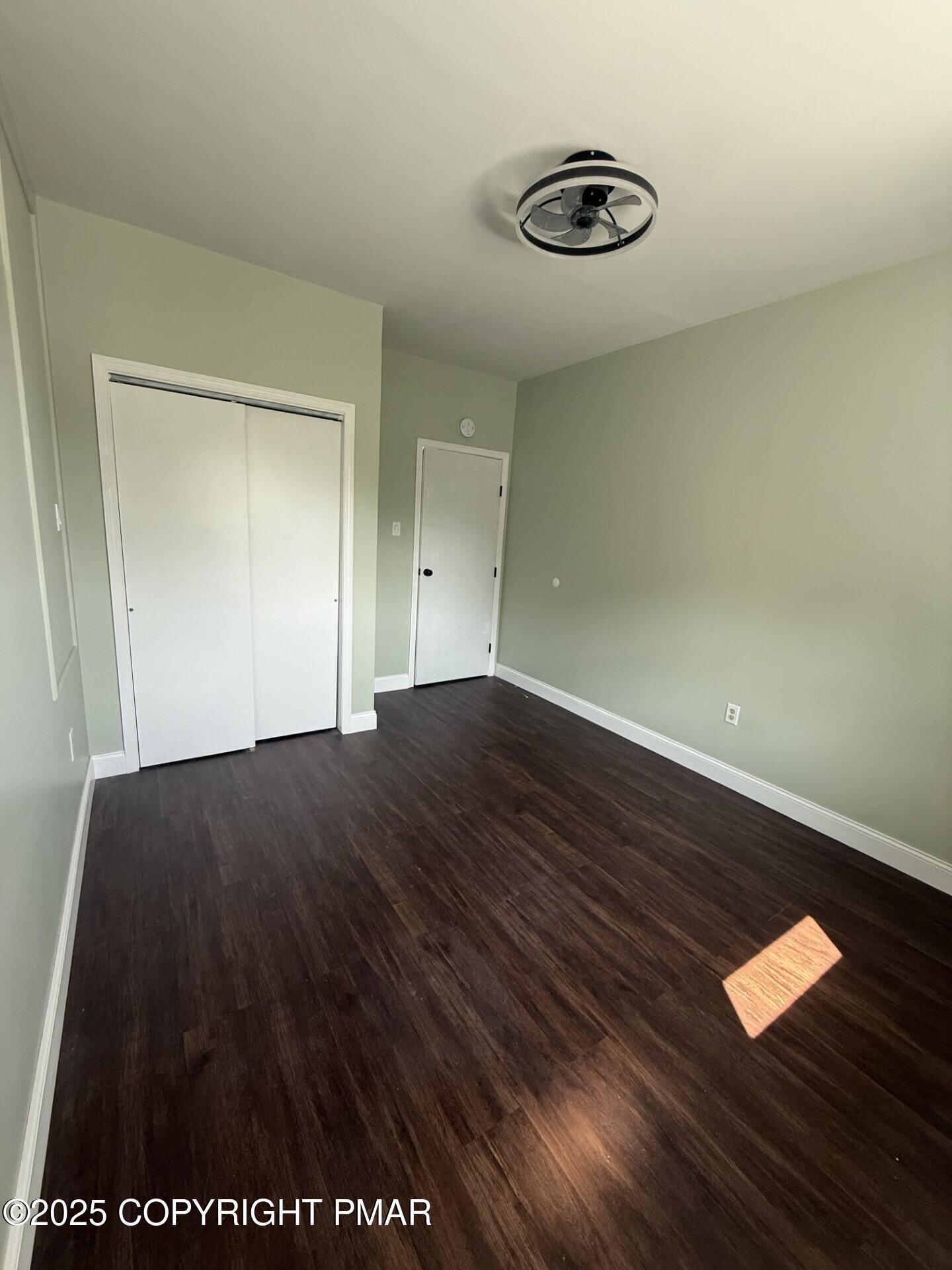 132 East Main Street, Unit 1C Girardville, PA 17935 - Photo 8 of 13 a view of empty room with wooden floor
