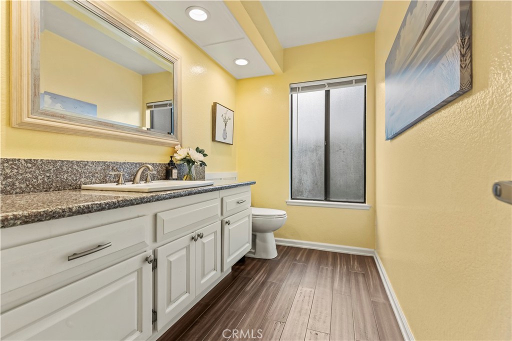 13 Recodo Irvine, CA 92620 - Photo 14 of 71 a bathroom with a granite countertop sink toilet and vanity