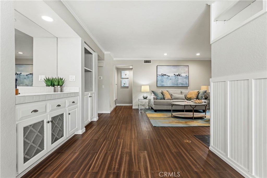13 Recodo Irvine, CA 92620 - Photo 21 of 71 a living room with furniture and a wooden floor