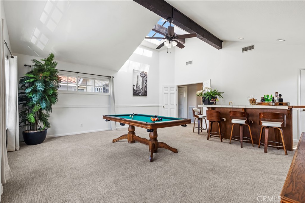 13 Recodo Irvine, CA 92620 - Photo 33 of 71 a room with furniture and potted plants