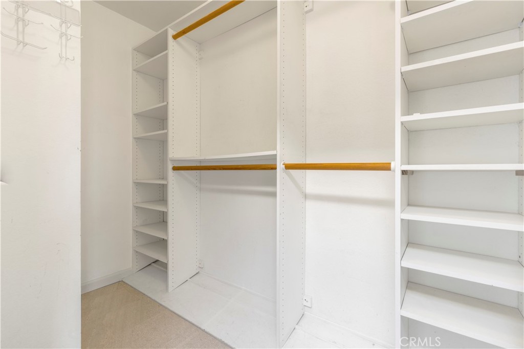 13 Recodo Irvine, CA 92620 - Photo 39 of 71 a view of walk in closet with empty racks