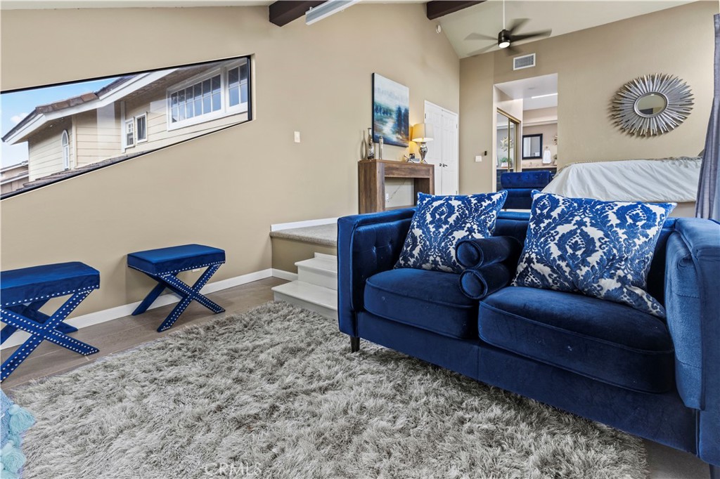 13 Recodo Irvine, CA 92620 - Photo 44 of 71 a living room with furniture and a rug