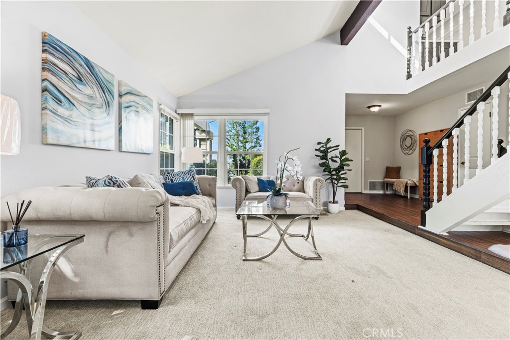 13 Recodo Irvine, CA 92620 - Photo 6 of 71 a living room with furniture and a potted plant