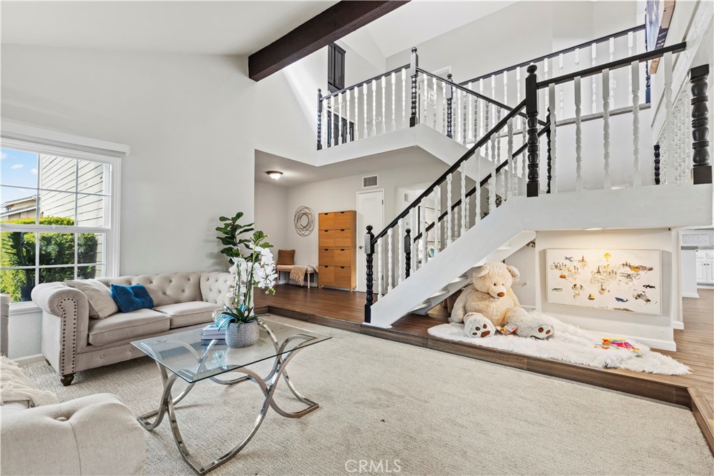 13 Recodo Irvine, CA 92620 - Photo 8 of 71 a living room with furniture and stairs