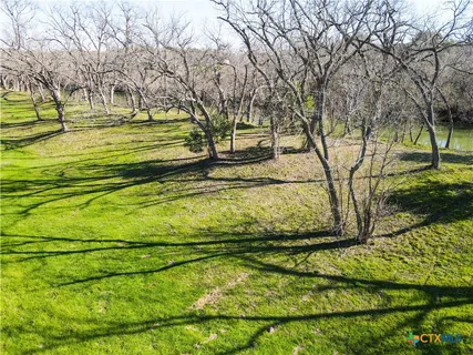 a view of swimming pool with a yard