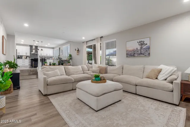 a bathroom with a sink mirror and toilet