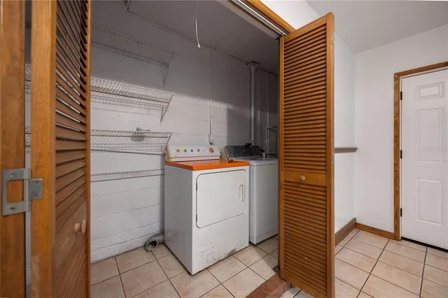 a kitchen with granite countertop cabinets stainless steel appliances and a sink
