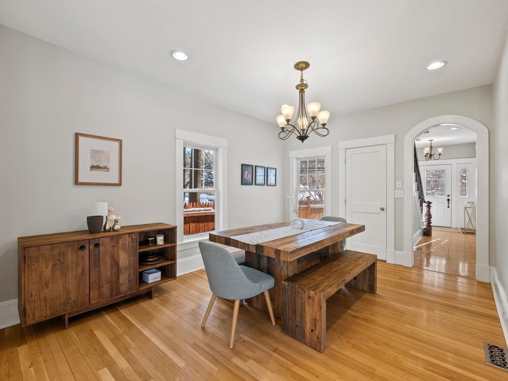 20 Maple Street Lexington, MA 02420 - Photo 14 of 36 a view of a dining room with furniture and wooden floor