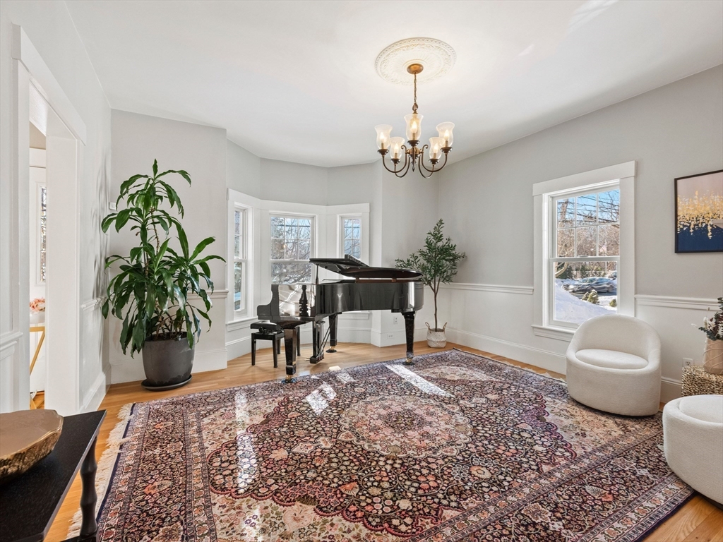 20 Maple Street Lexington, MA 02420 - Photo 15 of 36 a living room with furniture potted plant and window