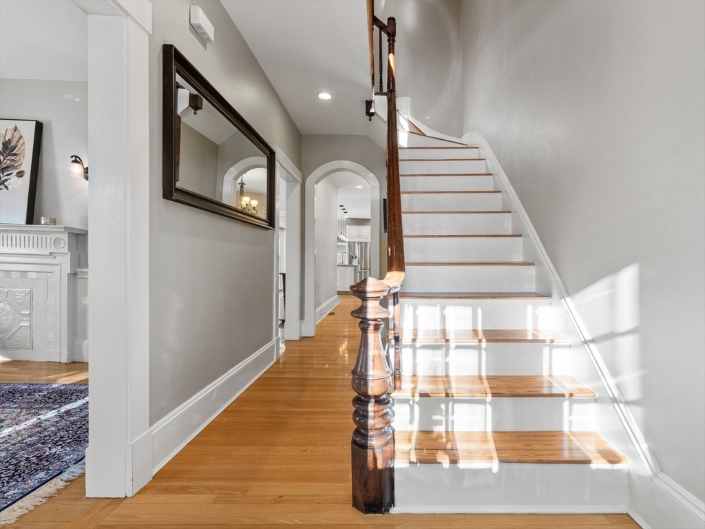20 Maple Street Lexington, MA 02420 - Photo 17 of 36 a view of entryway and hall with wooden floor
