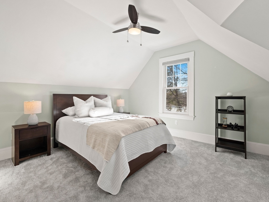 20 Maple Street Lexington, MA 02420 - Photo 28 of 36 a bedroom with a bed and a window