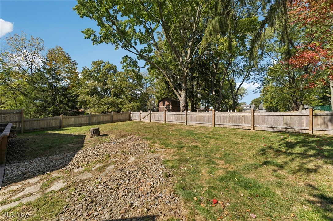 481 Meadowlane Road Independence, OH 44131 - Photo 33 of 40 Seller has added 2 sides of wood fencing to neighbors chain link close to home. Great for summer activities, pets and children.