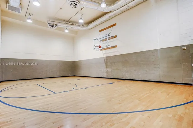 a view of swimming pool with outdoor seating and plants