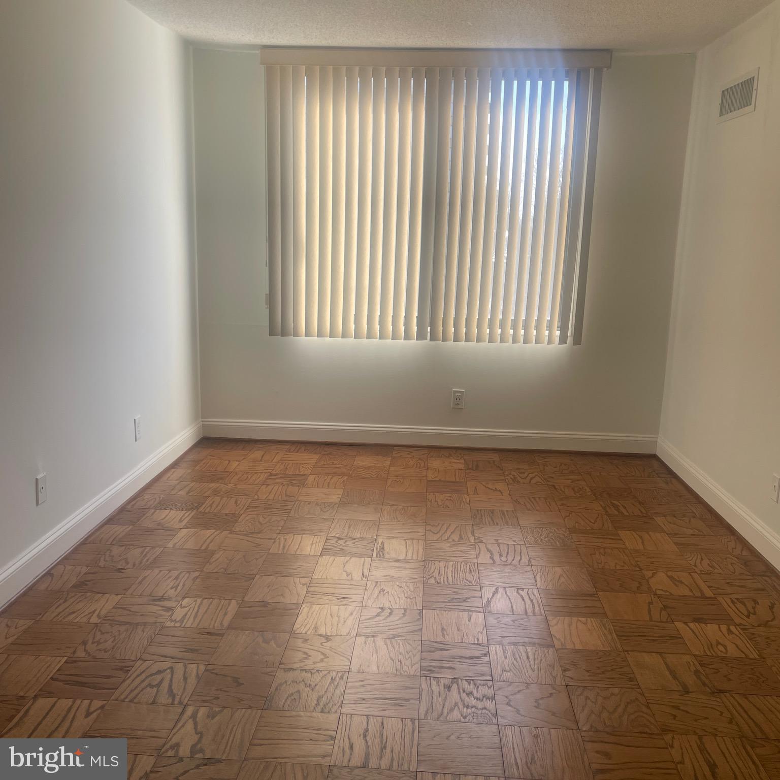5225 Pooks Hill Road, Unit 703N Bethesda, MD 20814 - Photo 5 of 55 a view of an empty room with a window