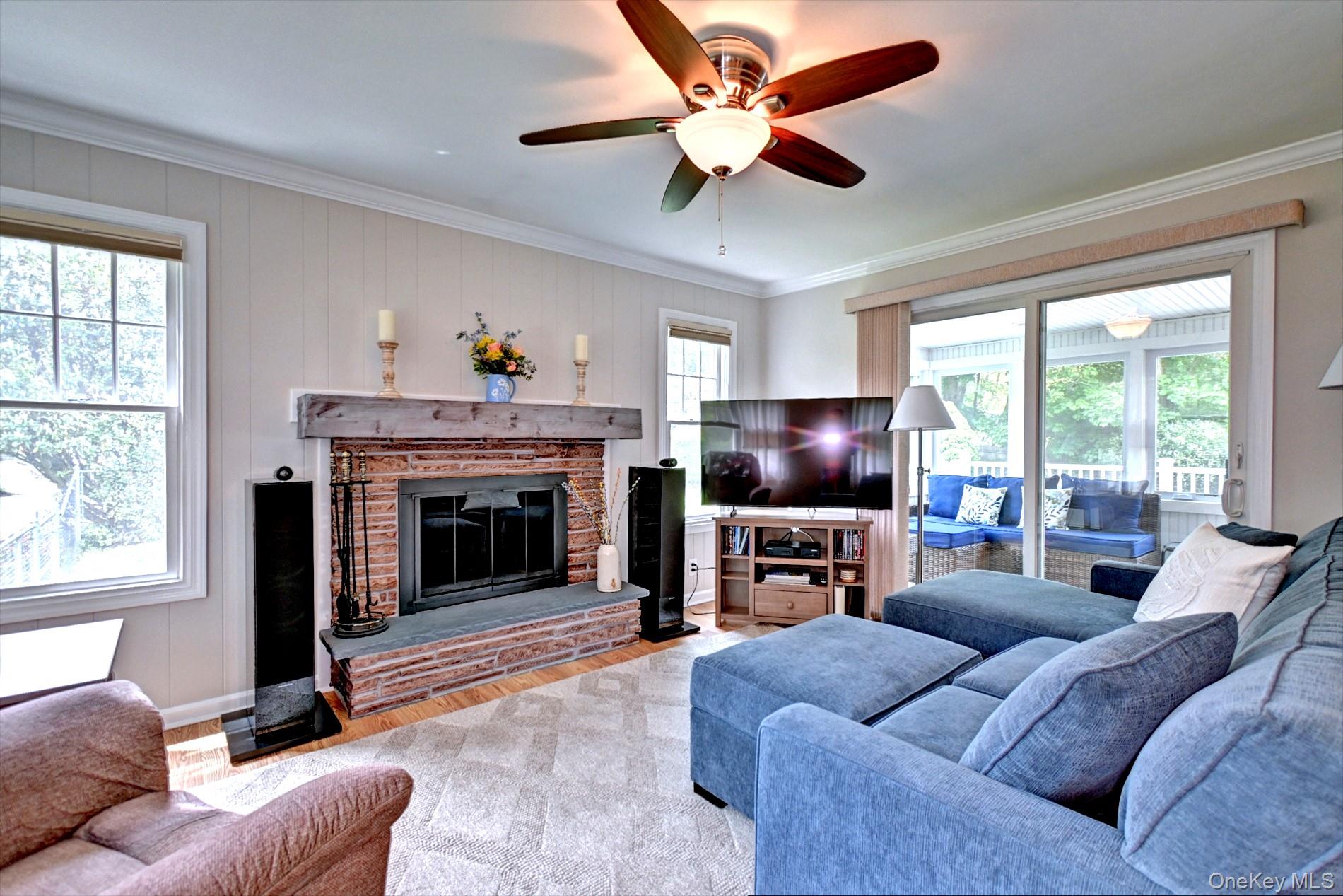 20 Valentine Road Shoreham, NY 11786 - Photo 7 of 39 Open slider to the Sunroom. Fireplace has Newer Chimney and Cap.