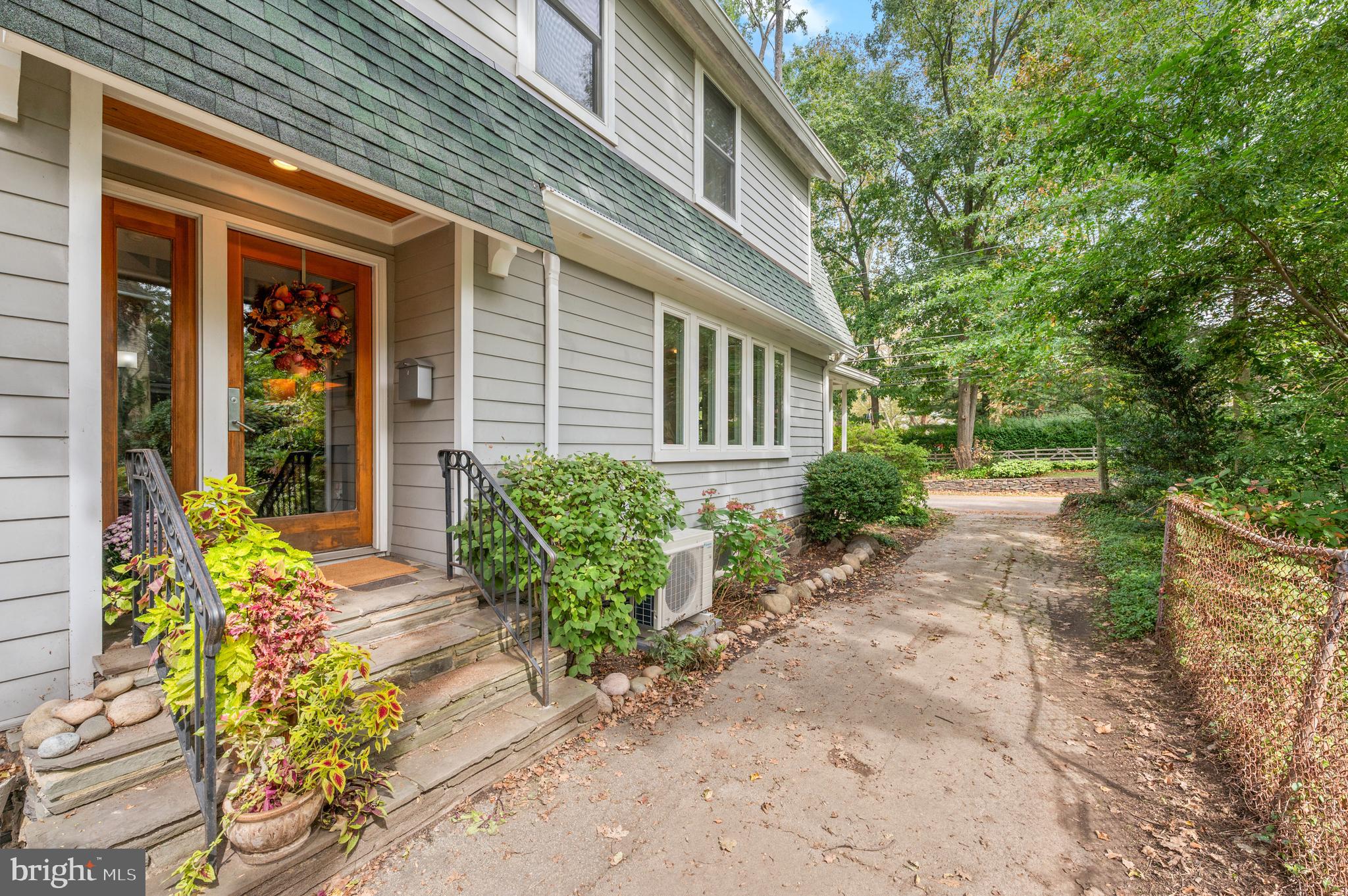 414 Mcclenaghan Mill Road Wynnewood, PA 19096 - Photo 2 of 43 a front view of a house with garden
