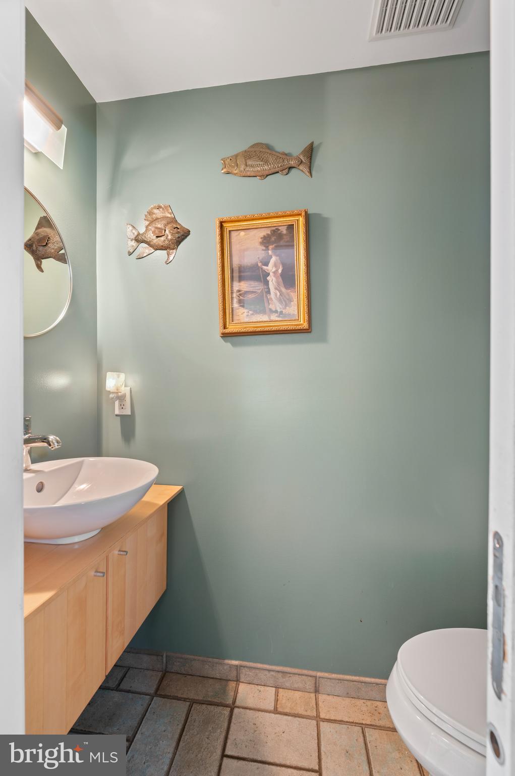 414 Mcclenaghan Mill Road Wynnewood, PA 19096 - Photo 28 of 43 a bathroom with a sink and a mirror