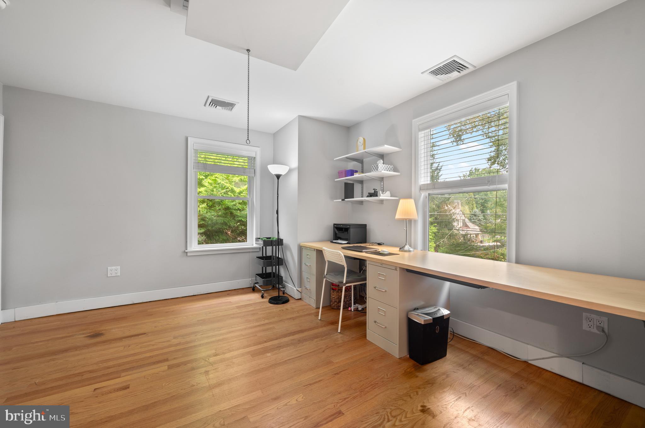 414 Mcclenaghan Mill Road Wynnewood, PA 19096 - Photo 34 of 43 a room with a wooden floor and a window
