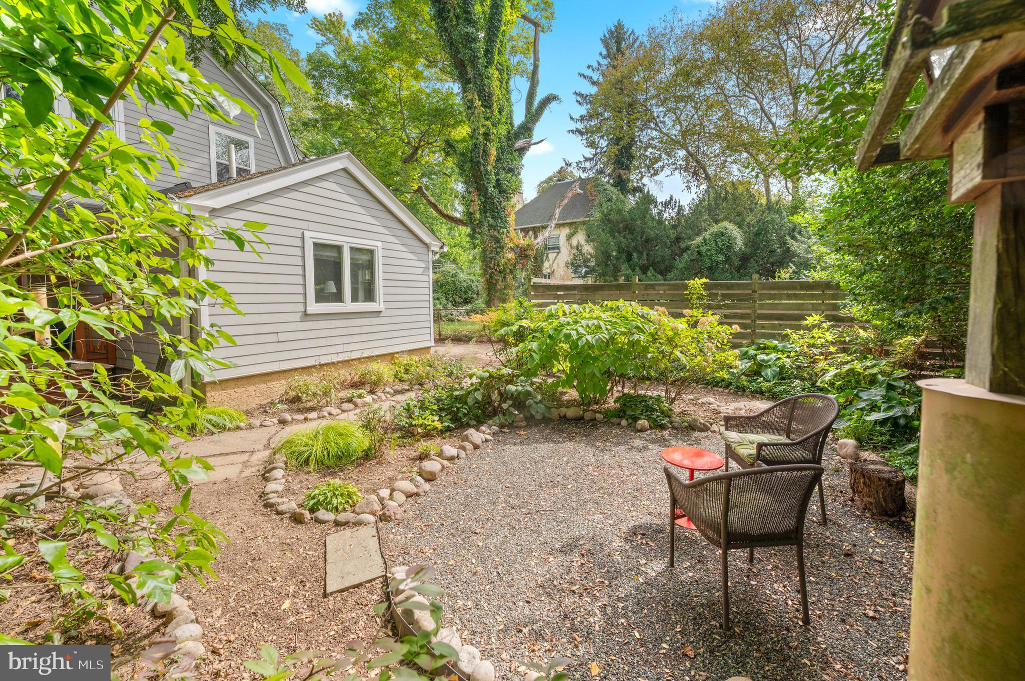 414 Mcclenaghan Mill Road Wynnewood, PA 19096 - Photo 8 of 43 a backyard of a house with table and chairs