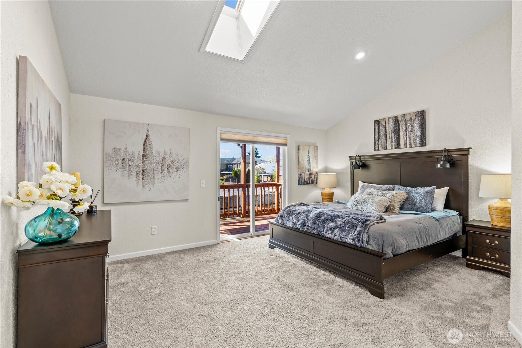 8109 15th Avenue Southwest Seattle, WA 98106 - Photo 14 of 39 a spacious bedroom with a bed and a window