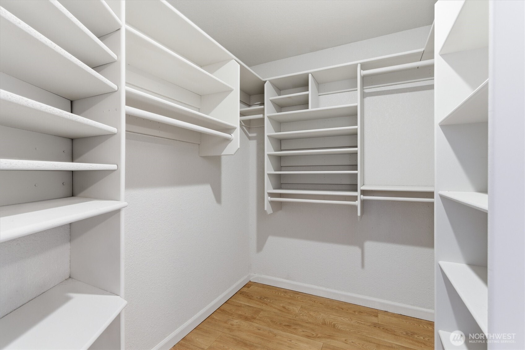 8109 15th Avenue Southwest Seattle, WA 98106 - Photo 19 of 39 a view of walk in closet with empty racks