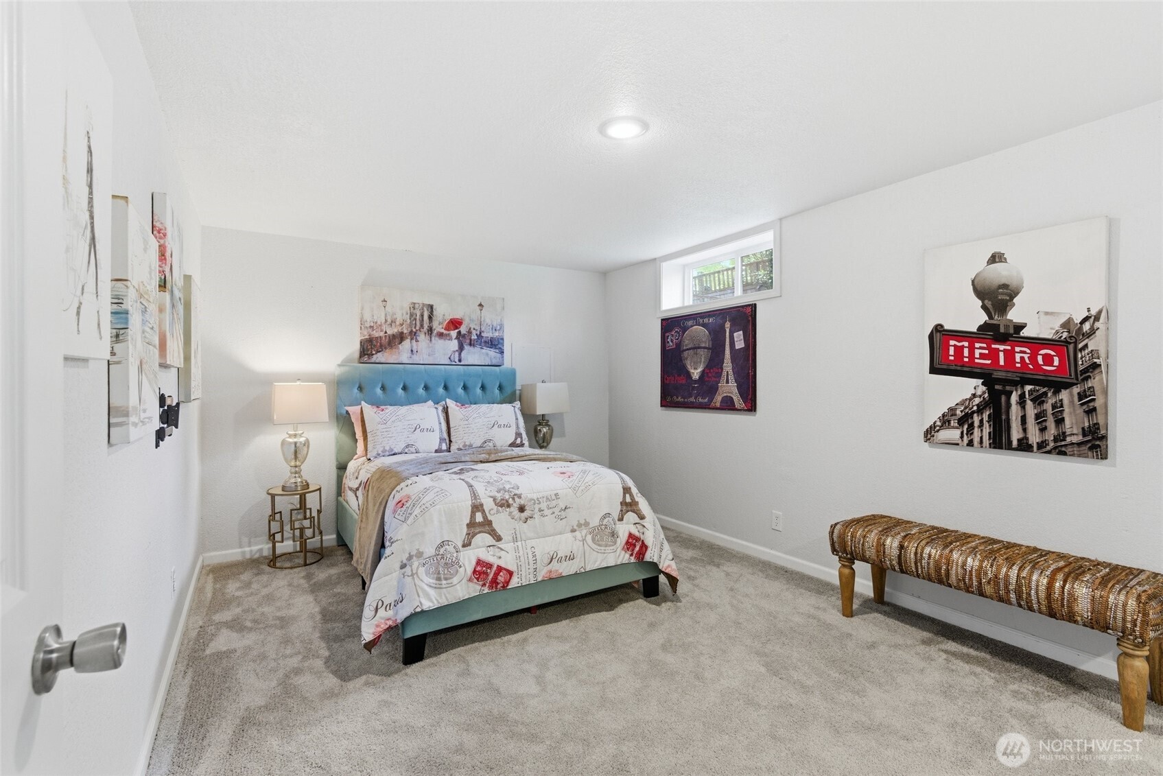 8109 15th Avenue Southwest Seattle, WA 98106 - Photo 29 of 39 a bedroom with a bed and a painting on the wall