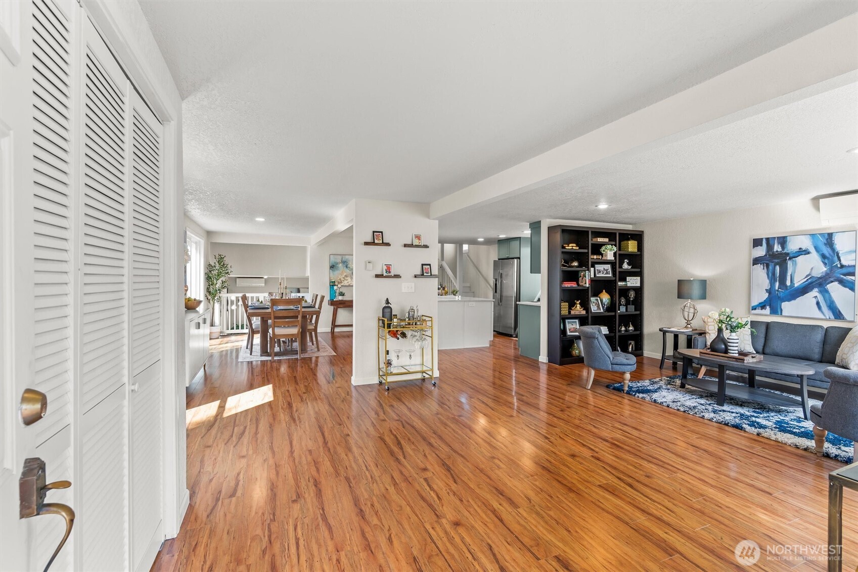 8109 15th Avenue Southwest Seattle, WA 98106 - Photo 4 of 39 a living room with furniture and wooden floor