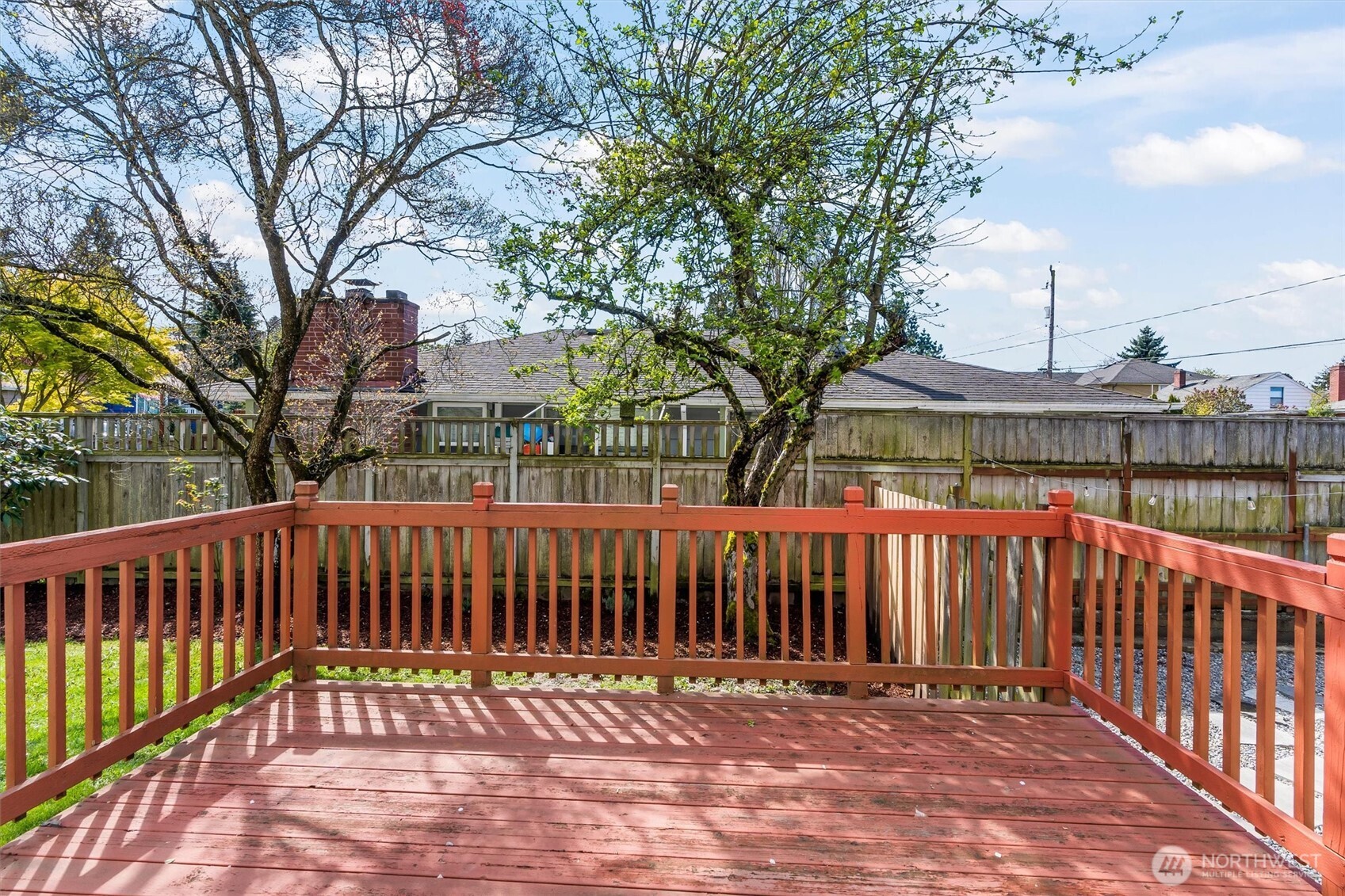 8109 15th Avenue Southwest Seattle, WA 98106 - Photo 10 of 39 a view of a wooden roof deck