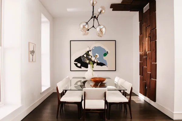 a kitchen with a sink cabinets and appliances