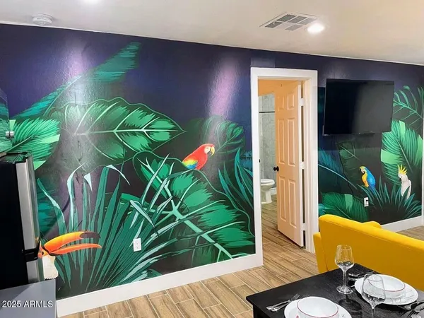 a view of entryway with wooden floor